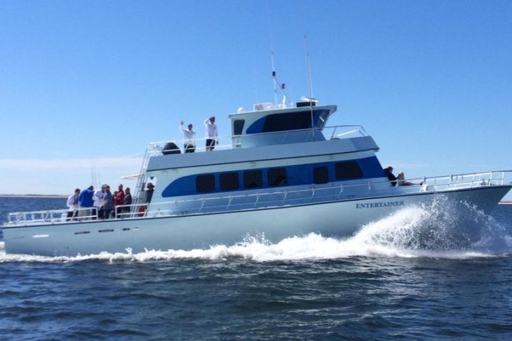 a small boat in a large body of water